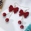 Velvety Bow Dangle Earrings: Ruby