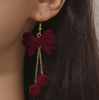 Velvety Bow Dangle Earrings: Ruby