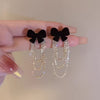 Velvety Bow Rhinestone Earrings: Black