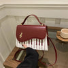 Sweet Note Piano Purse: Claret